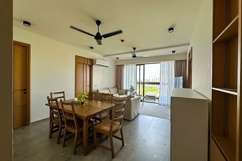 Fully furnished 3+1 bedroom luxury apartment in Solitaire, 8th Floor, Hulhumale'. A photo of the living area and dining area.