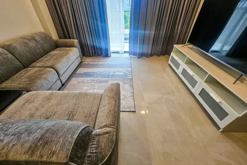 Fully furnished 3 bedroom semi-luxury apartment in RainCoral Residence, 4th Floor, Hulhumale'. A photo of the living area.