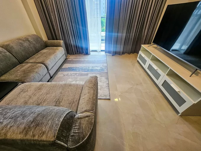Fully furnished 3 bedroom semi-luxury apartment in RainCoral Residence, 4th Floor, Hulhumale'. A photo of the living area.